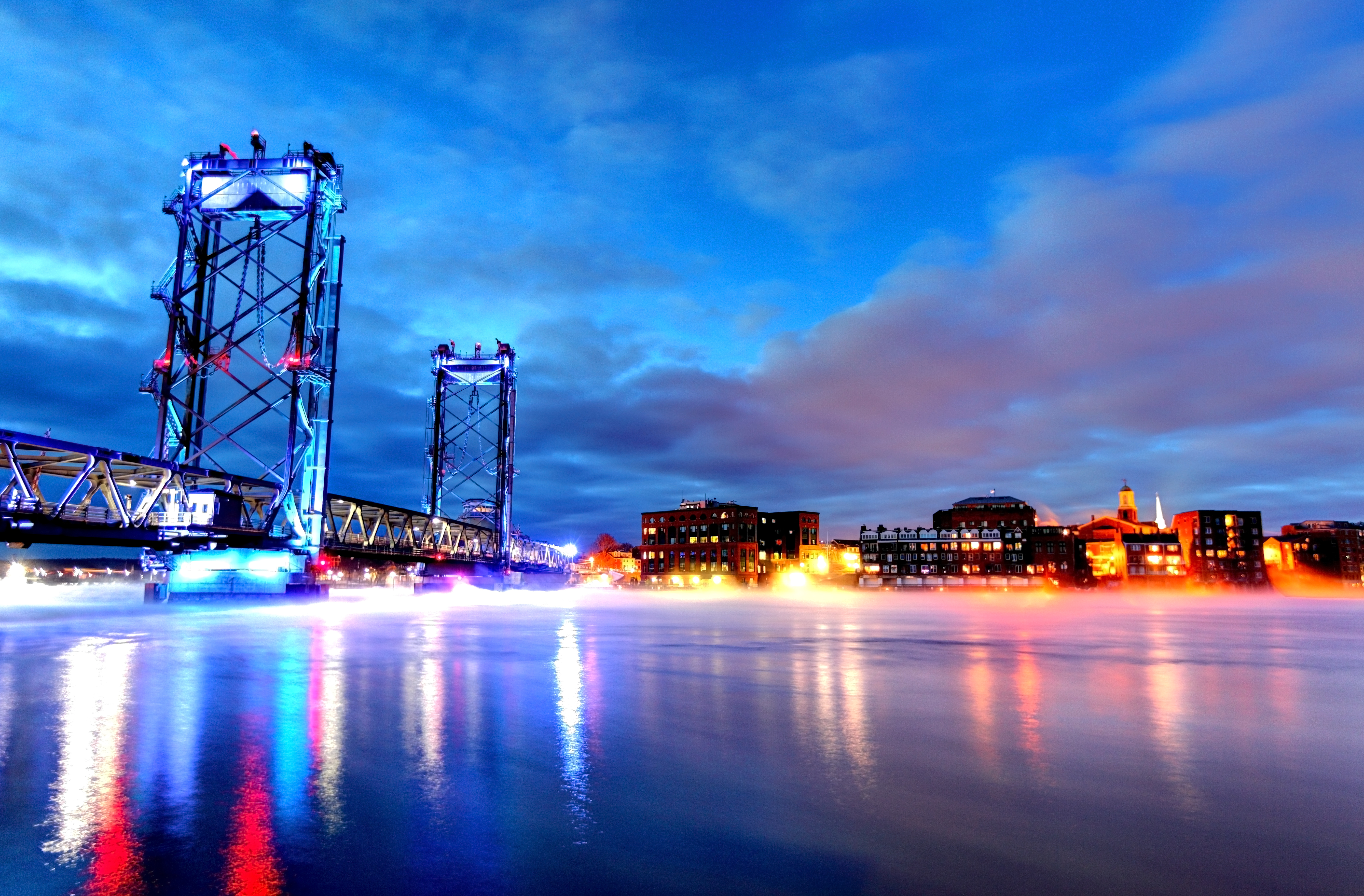A bridge spanning through morning fog — the crossing from search to answers